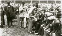 William shaking hands with the Prince of Wales (Believed to be at Boundary Park, Oldham)