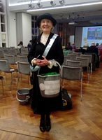 Volunteer researcher, on the project, Jenni with charity collecting bucket!