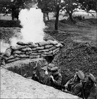 Three British soldiers in trench under fire during World War I