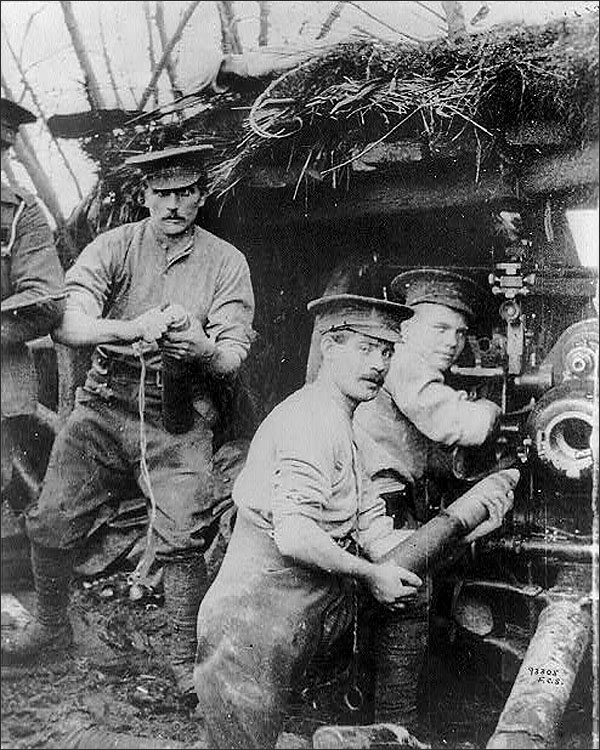 Loading a British gun in concealed shelter