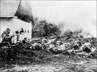 German soldiers firing at attacking French troops from prone position