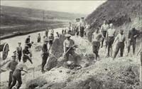 soldiers diging by the road