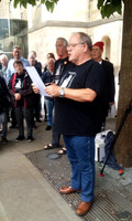 John Henshaw reading the names of those killed on the day