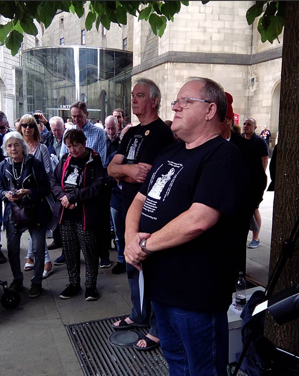 A minute's silence to respect the fallen, after the reading of the names by John Henshaw